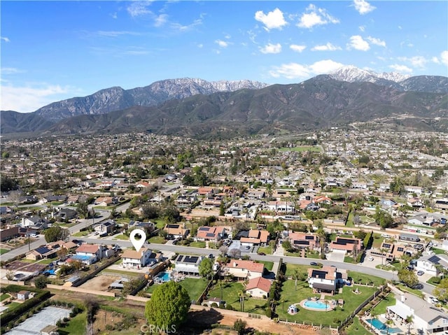 birds eye view of property featuring a residential view and a mountain view