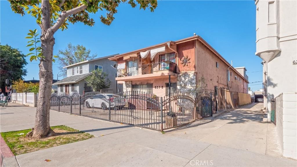 view of property with a fenced front yard