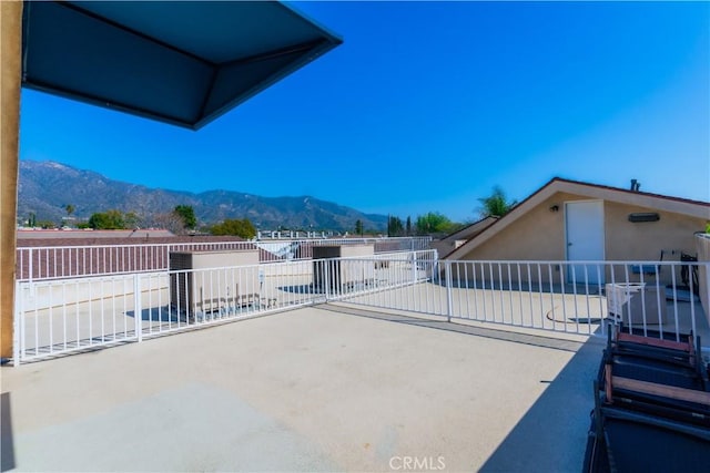 view of patio with a mountain view