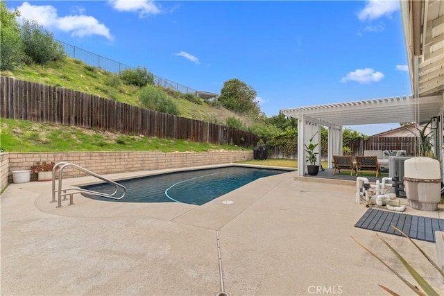 view of pool featuring a patio area, a fenced backyard, a fenced in pool, and a pergola