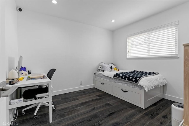 bedroom featuring dark wood-type flooring, recessed lighting, and baseboards