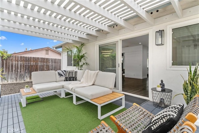 view of patio / terrace featuring outdoor lounge area, fence, and a pergola