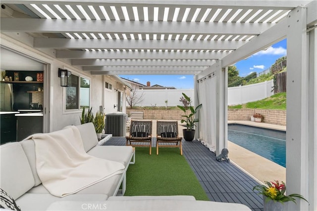 view of patio with a fenced backyard, a fenced in pool, outdoor lounge area, and a pergola