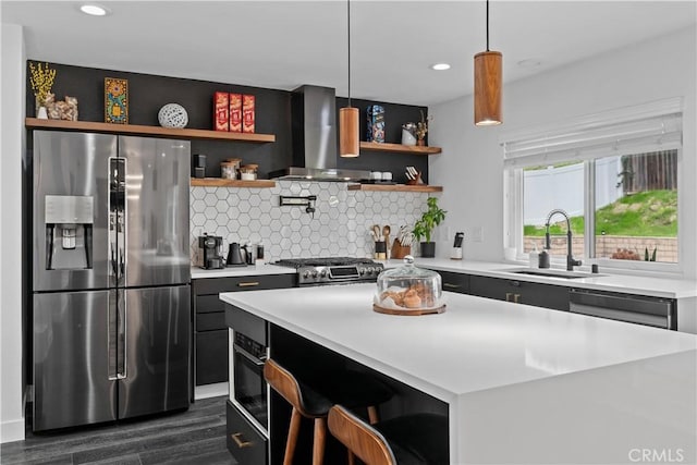 kitchen featuring stainless steel refrigerator with ice dispenser, open shelves, light countertops, decorative backsplash, and wall chimney range hood