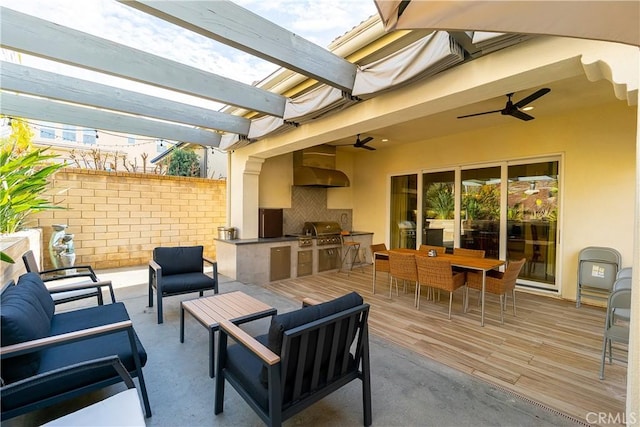 view of patio with ceiling fan, a grill, exterior kitchen, outdoor lounge area, and outdoor dining space