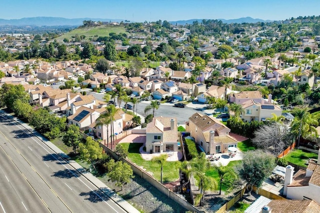 bird's eye view with a residential view and a mountain view