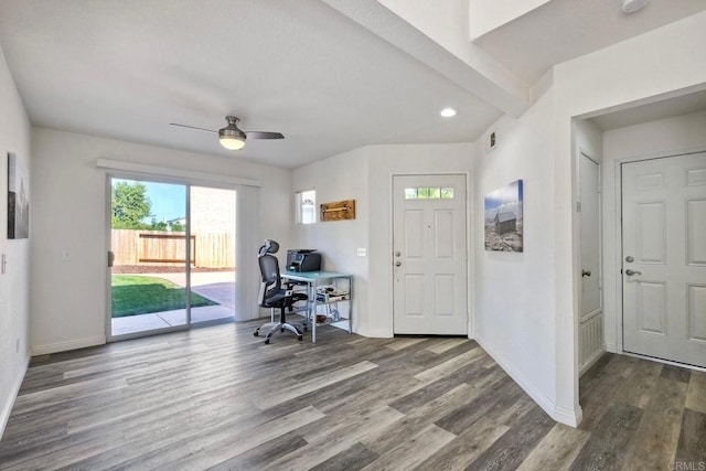 office area featuring a ceiling fan, baseboards, and wood finished floors