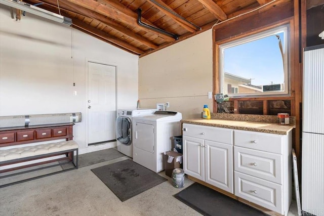 3735 Budd St, San Diego, CA 92111 - clothes washing area featuring wooden ceiling, washer and clothes dryer, and laundry area