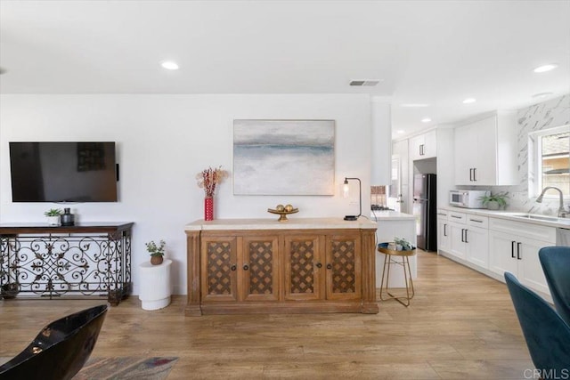 3735 Budd St, San Diego, CA 92111 - interior space featuring visible vents, recessed lighting, and light wood-type flooring