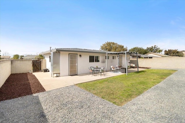 3735 Budd St, San Diego, CA 92111 - rear view of house with a fenced backyard, a gate, stucco siding, and a patio