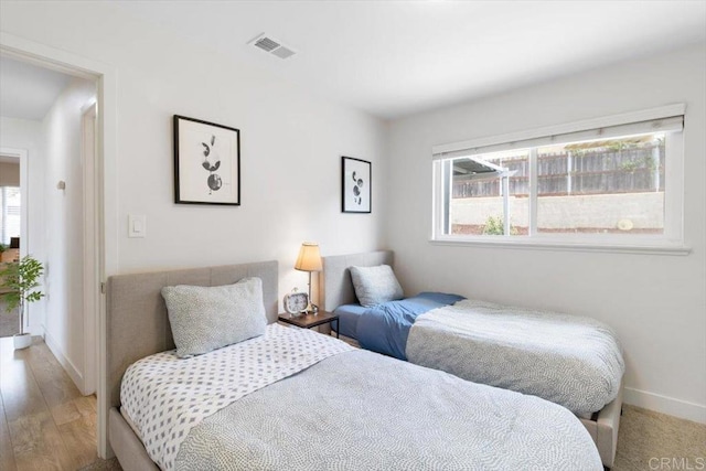 3735 Budd St, San Diego, CA 92111 - bedroom with baseboards, light wood-style flooring, visible vents, and multiple windows
