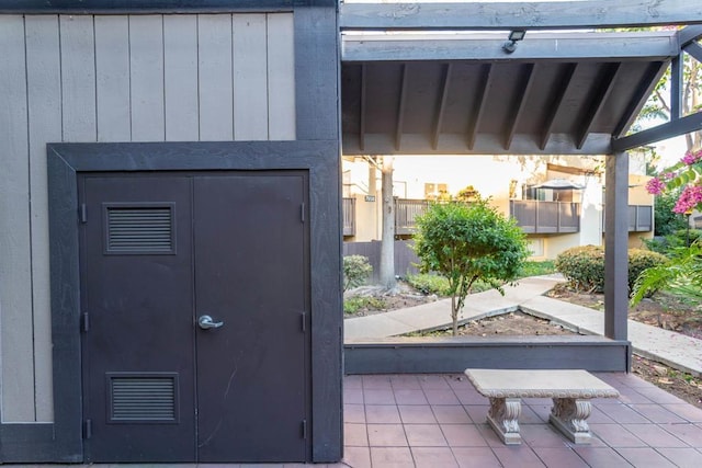 property entrance with visible vents