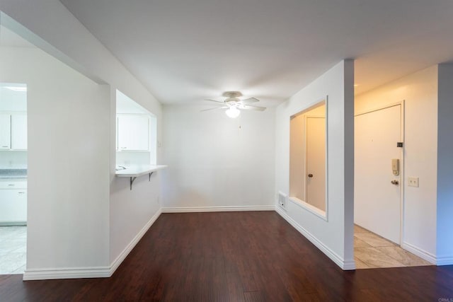 bonus room with visible vents, baseboards, and wood finished floors