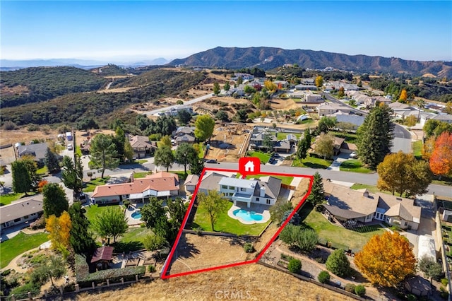 aerial view with a residential view and a mountain view