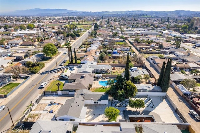 aerial view featuring a residential view and a mountain view