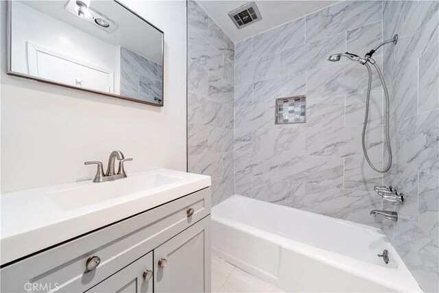 full bath featuring bathtub / shower combination and vanity