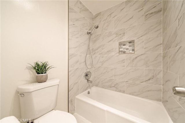 full bathroom with toilet and bathtub / shower combination