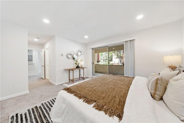 carpeted bedroom with baseboards and recessed lighting