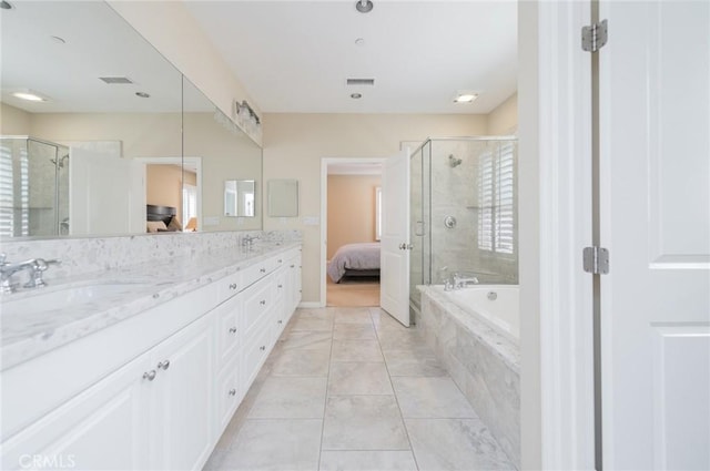 ensuite bathroom featuring a bath, a stall shower, visible vents, and connected bathroom