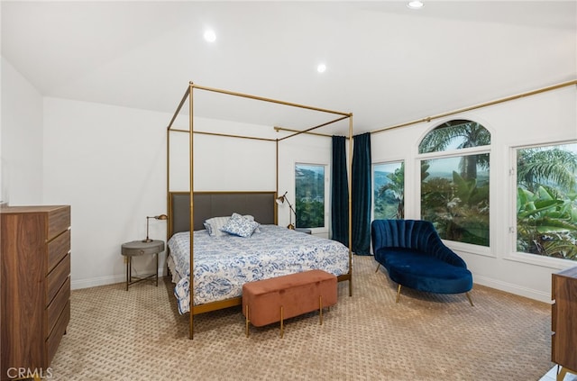 bedroom with lofted ceiling, light carpet, baseboards, and recessed lighting