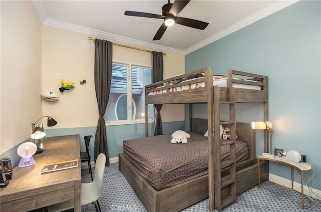 carpeted bedroom with baseboards, a ceiling fan, and crown molding