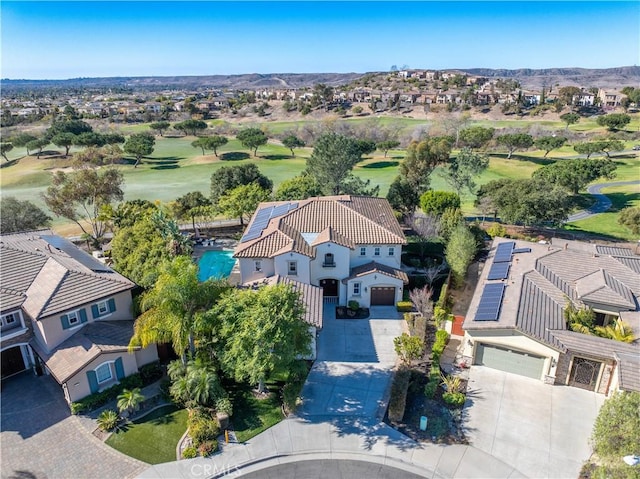 bird's eye view with a residential view, a mountain view, and golf course view