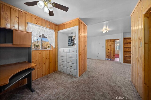 31251 Aliso Canyon Rd, Acton, CA 93550 - carpeted office space featuring wooden walls, a wealth of natural light, and ceiling fan