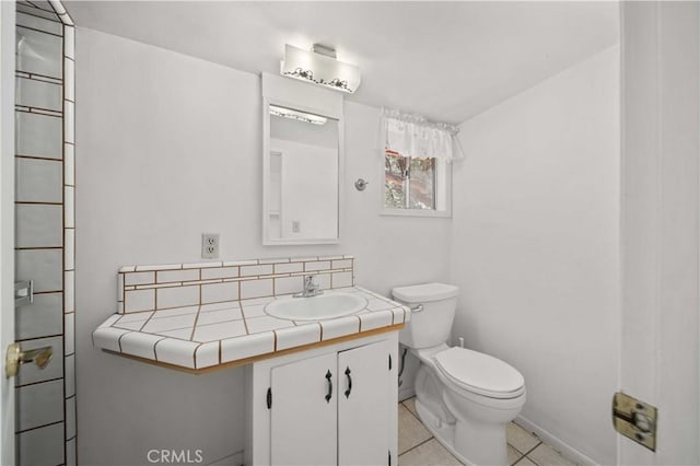 31251 Aliso Canyon Rd, Acton, CA 93550 - bathroom featuring decorative backsplash, vanity, tile patterned flooring, and toilet