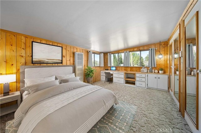 31251 Aliso Canyon Rd, Acton, CA 93550 - bedroom with wooden walls, built in study area, light carpet, and a heating unit