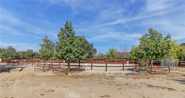41215 Avenida De Los Posas, Murrieta, CA 92562 - view of horse barn featuring a rural view