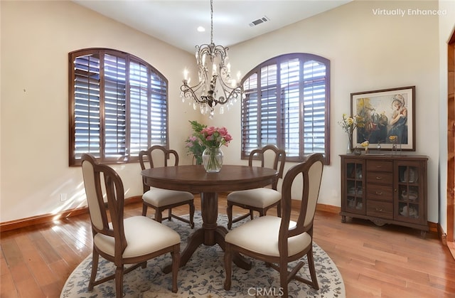 41215 Avenida De Los Posas, Murrieta, CA 92562 - dining space with light wood finished floors, baseboards, visible vents, and a chandelier