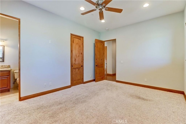 41215 Avenida De Los Posas, Murrieta, CA 92562 - unfurnished bedroom with baseboards, connected bathroom, ceiling fan, recessed lighting, and light carpet