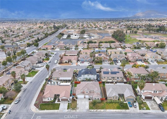 birds eye view of property featuring a residential view and a mountain view