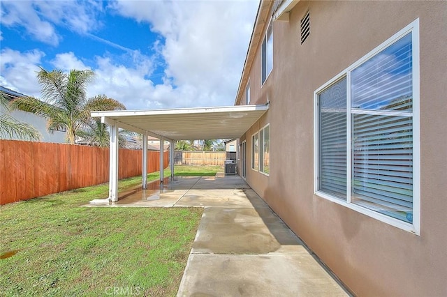 view of yard with a patio area and a fenced backyard