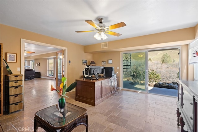848 Burlando Rd, Kernville, CA 93238 - office featuring stone tile floors, plenty of natural light, and ceiling fan