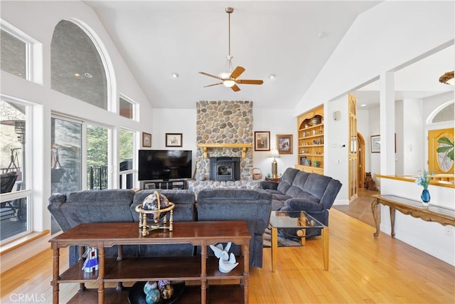 848 Burlando Rd, Kernville, CA 93238 - living area with light wood-type flooring, a ceiling fan, high vaulted ceiling, and a fireplace