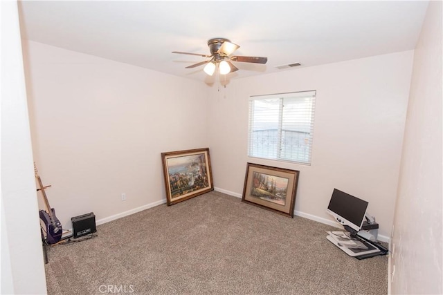 miscellaneous room featuring baseboards, visible vents, ceiling fan, and carpet flooring