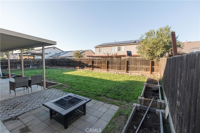 view of yard featuring a fenced backyard and a patio