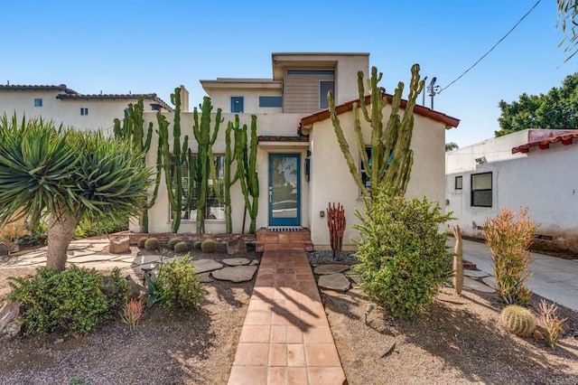 mediterranean / spanish-style house featuring stucco siding