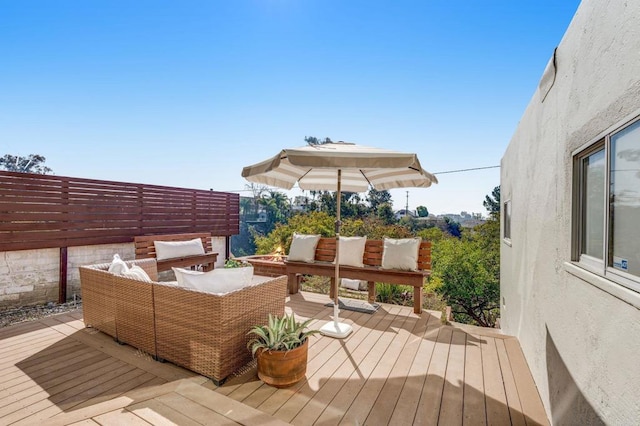 deck featuring outdoor lounge area