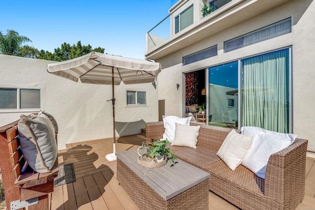 deck featuring an outdoor living space