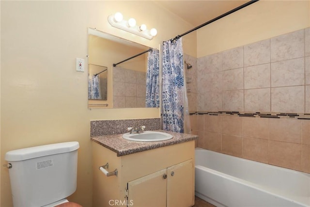 full bathroom featuring toilet, shower / bathtub combination with curtain, and vanity