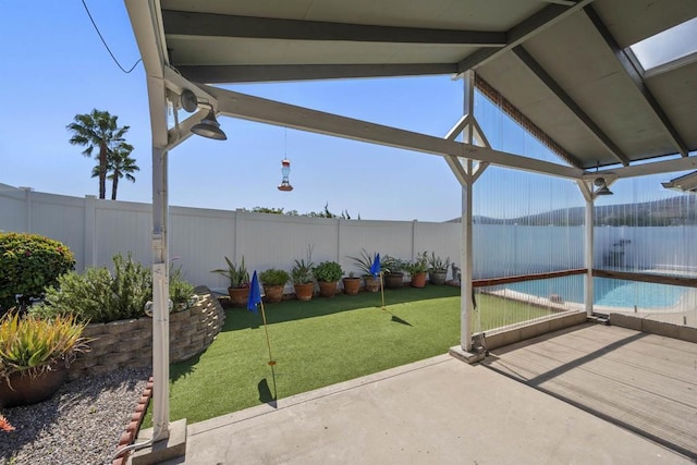 view of patio featuring a fenced backyard