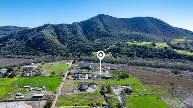 drone / aerial view featuring a mountain view