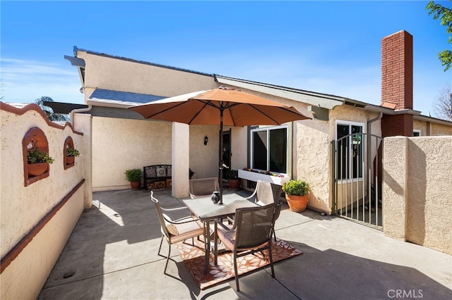 view of patio / terrace with fence and outdoor dining area