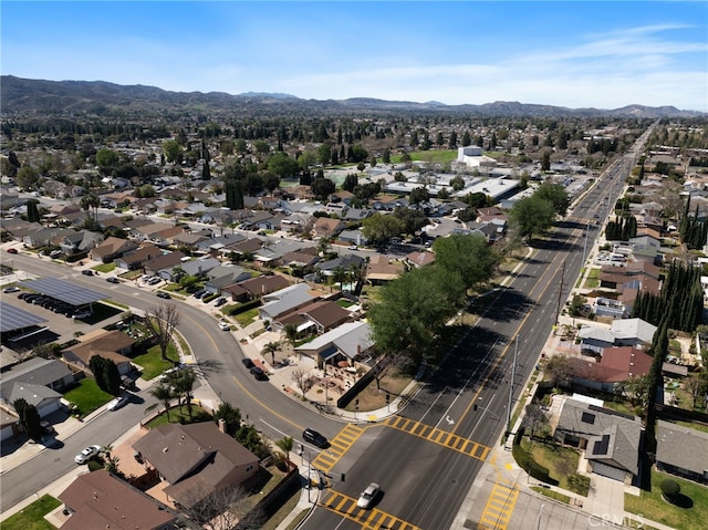 birds eye view of property with a residential view and a mountain view