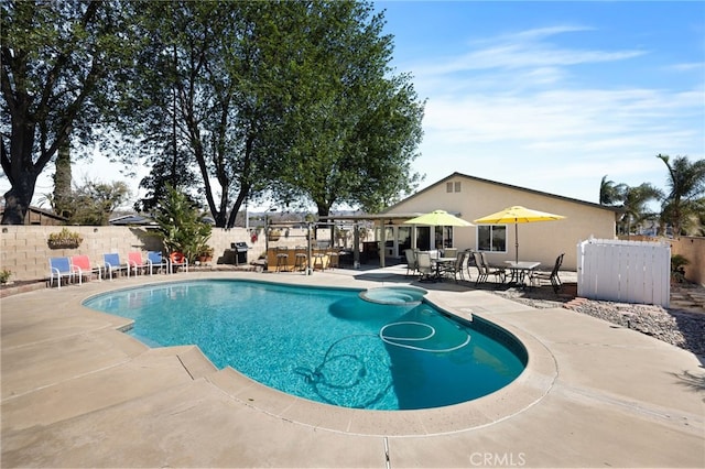 view of pool with a patio area, a fenced backyard, and a fenced in pool