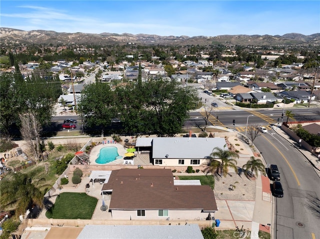 bird's eye view with a residential view and a mountain view