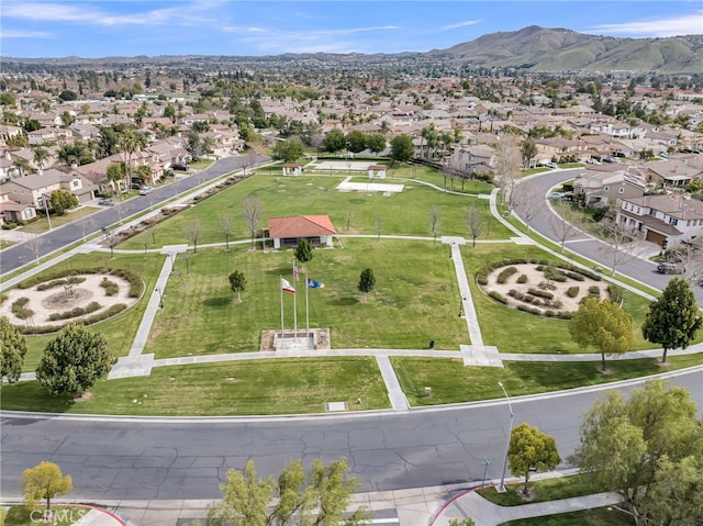 birds eye view of property featuring a mountain view and a residential view