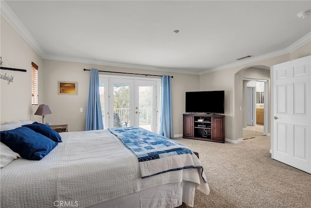 carpeted bedroom featuring arched walkways, visible vents, baseboards, access to exterior, and ornamental molding